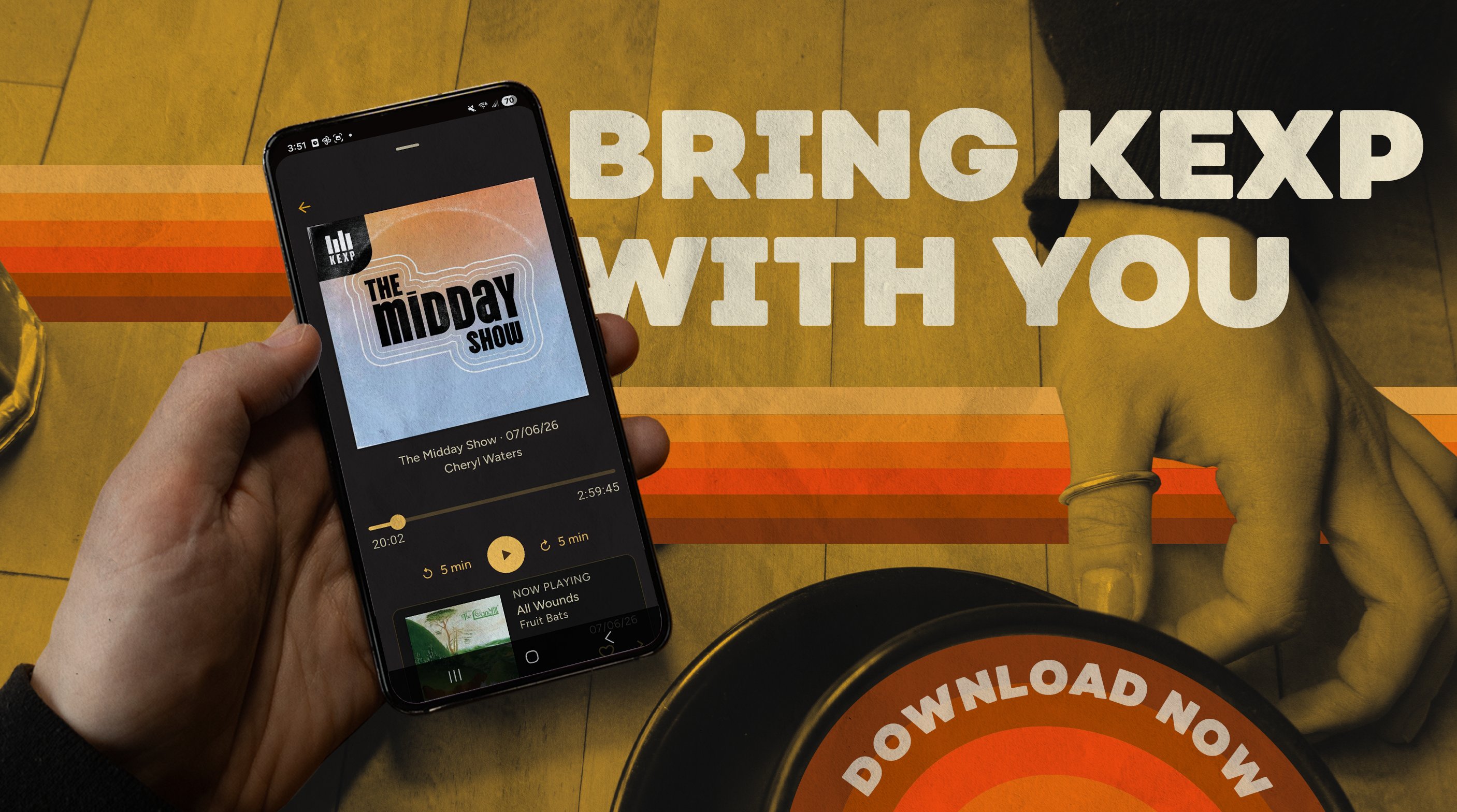 A smartphone with the KEXP app playing the Midday Show from the Archive